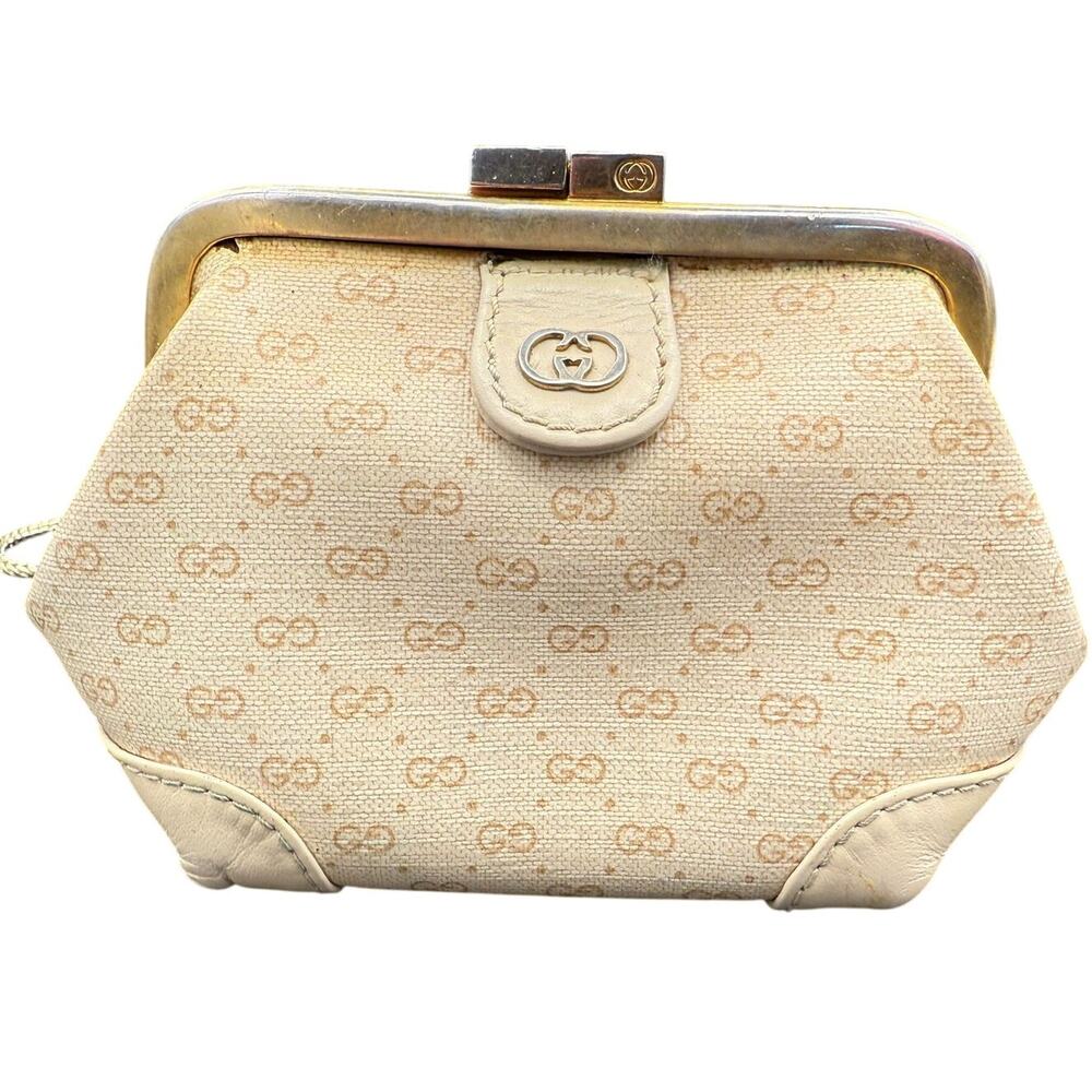 Gucci Brown Shoulder Bag with Iconic Monogram and Gold Clasp